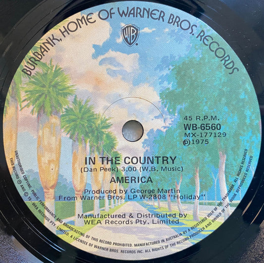 America (2) : Woman Tonight / In The Country (7", Single)