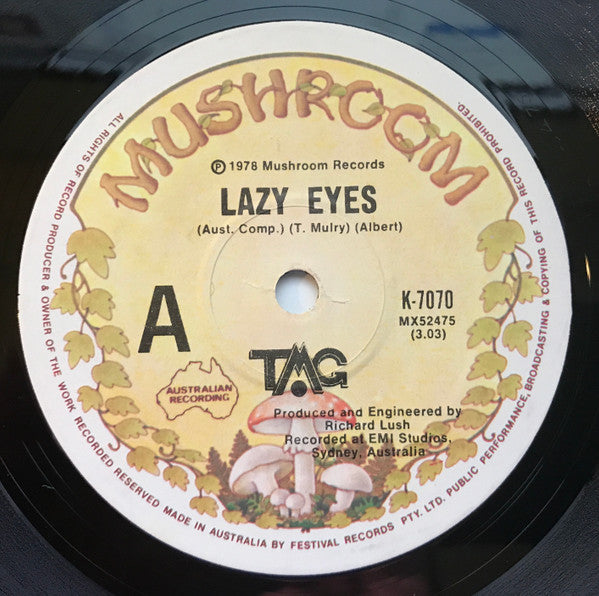 TMG* : Lazy Eyes (7", Single)