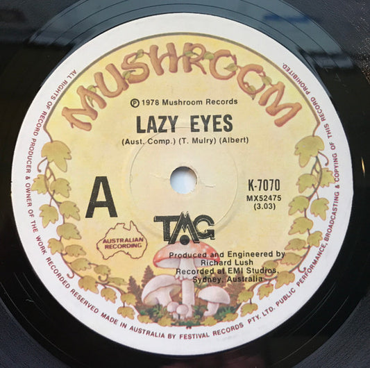 TMG* : Lazy Eyes (7", Single)