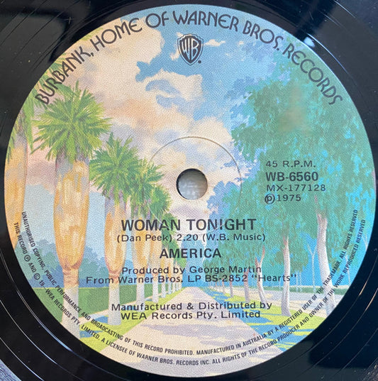 America (2) : Woman Tonight / In The Country (7", Single)