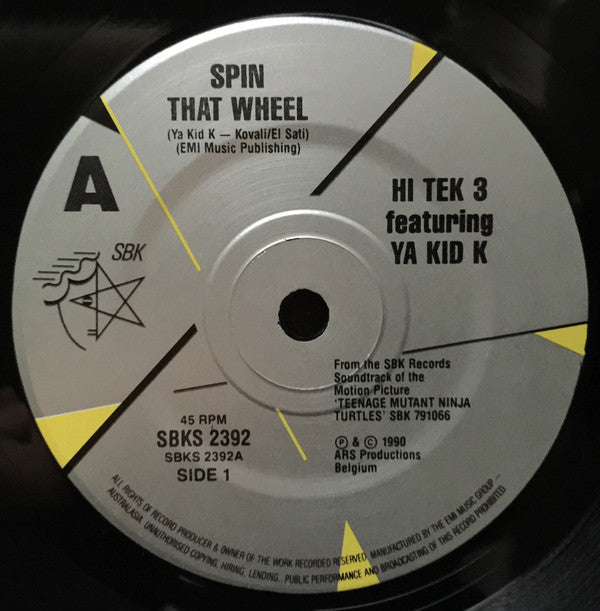 Hi Tek 3 Featuring Ya Kid K : Spin That Wheel (Turtles Get Real!) (7", Single)